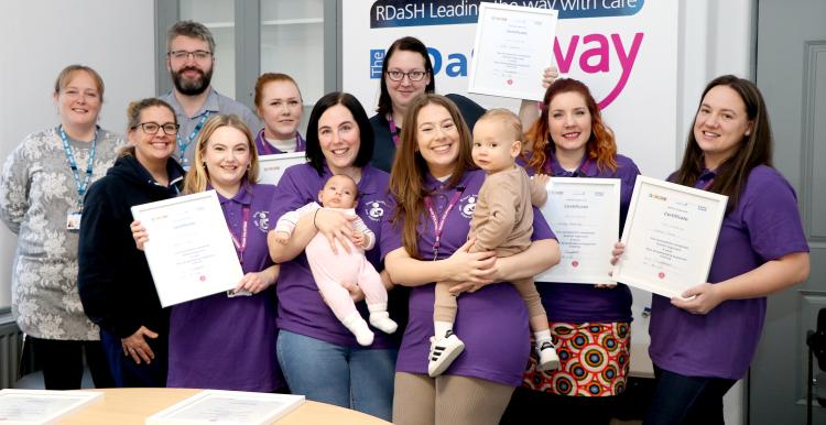 The new Breastfeeding Peer Support Volunteers with their certificates