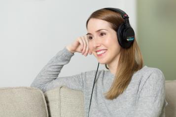 Woman lwith headphones on